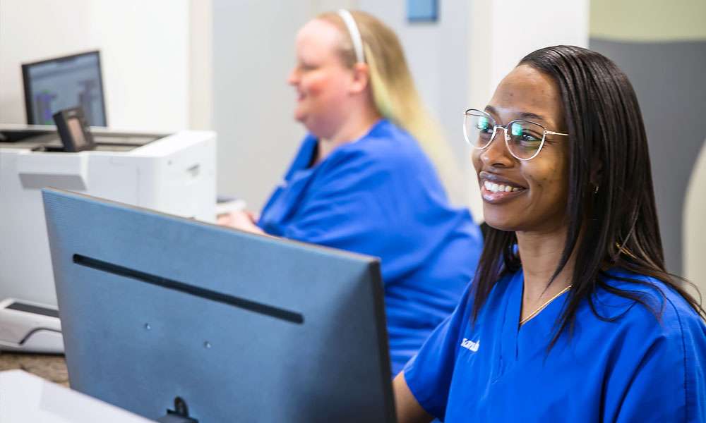 photo of two receptionists